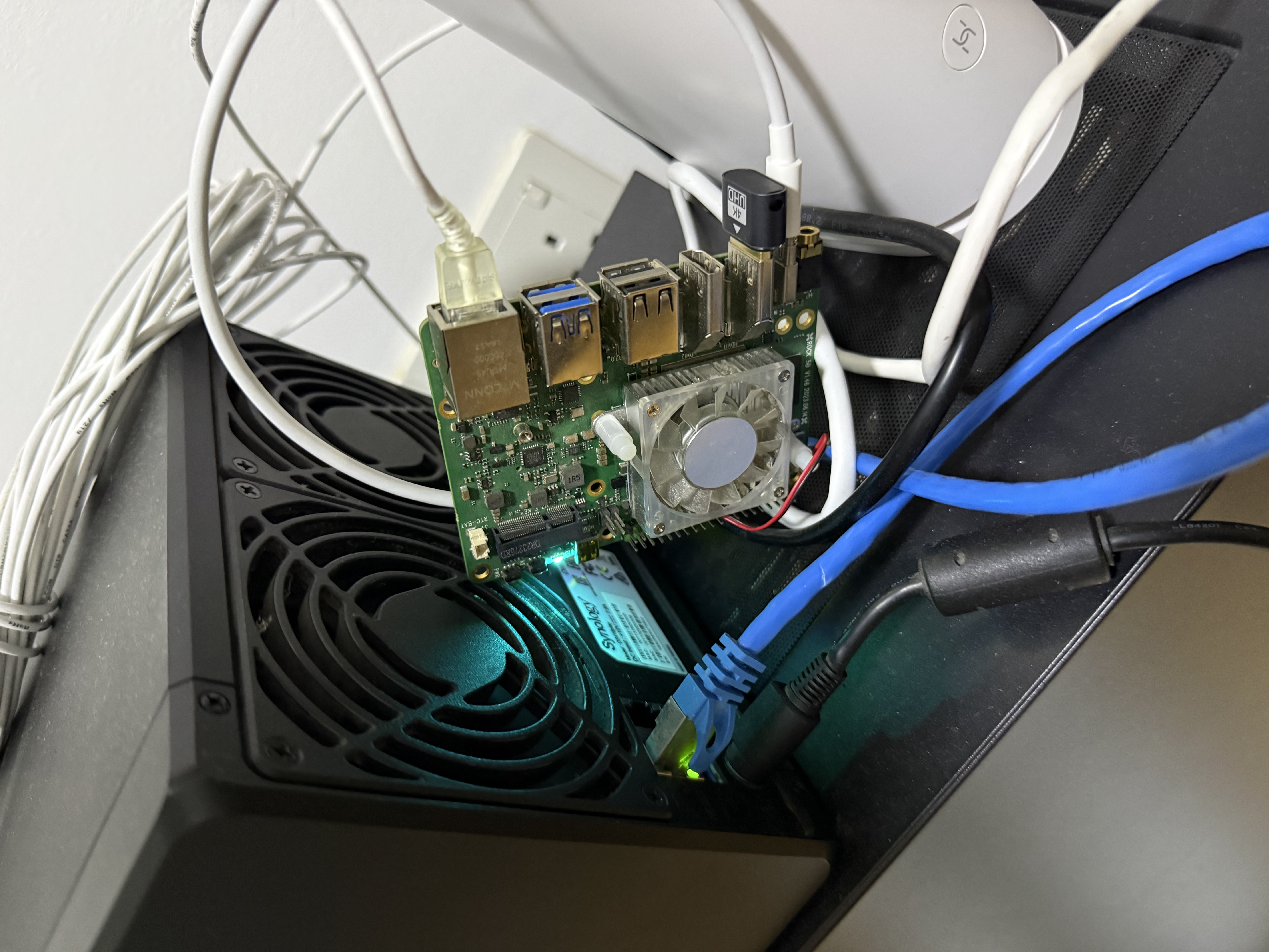 Rock 5B tucked behind a Synology NAS